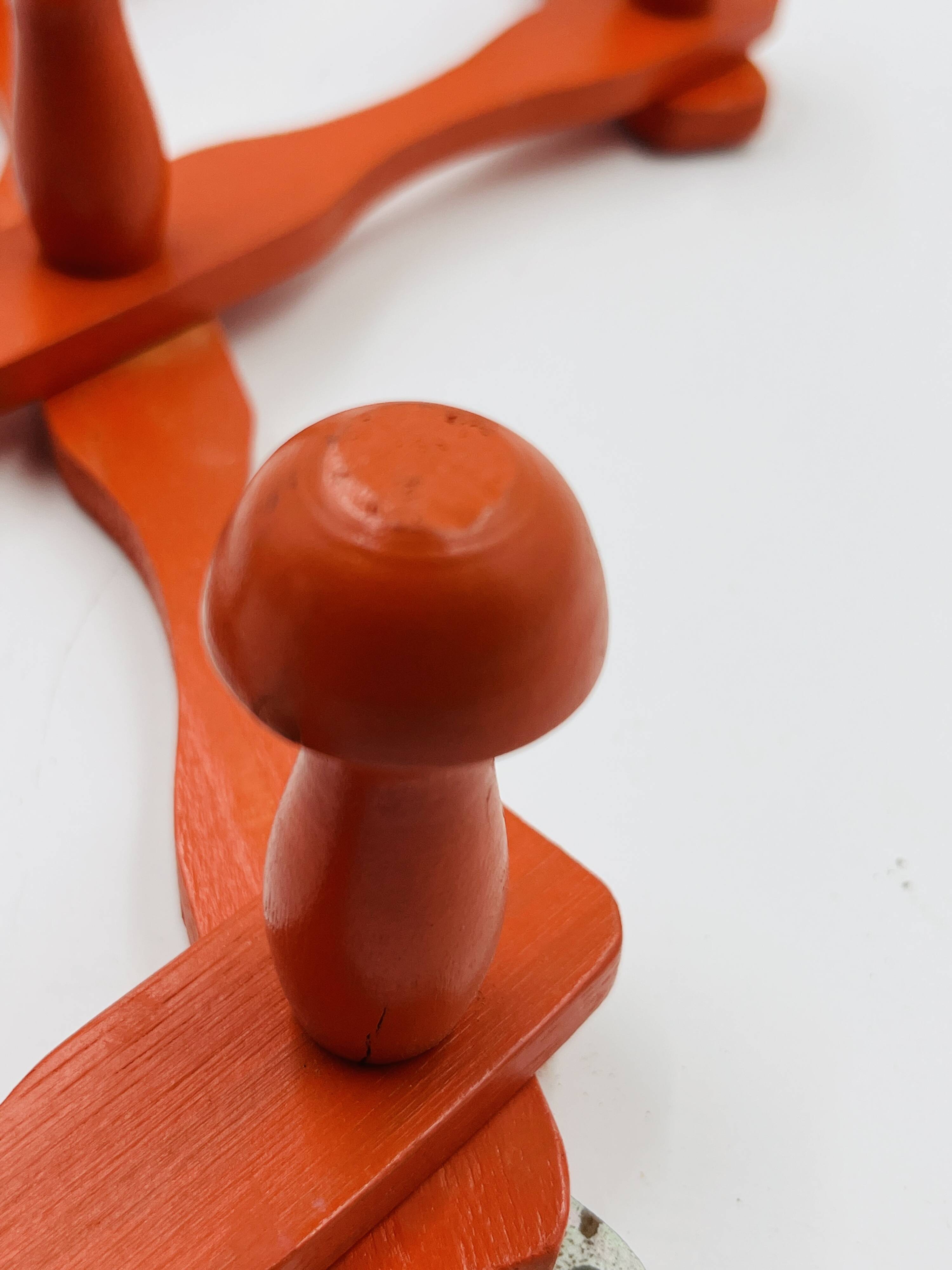 Vintage orange accordion coat rack