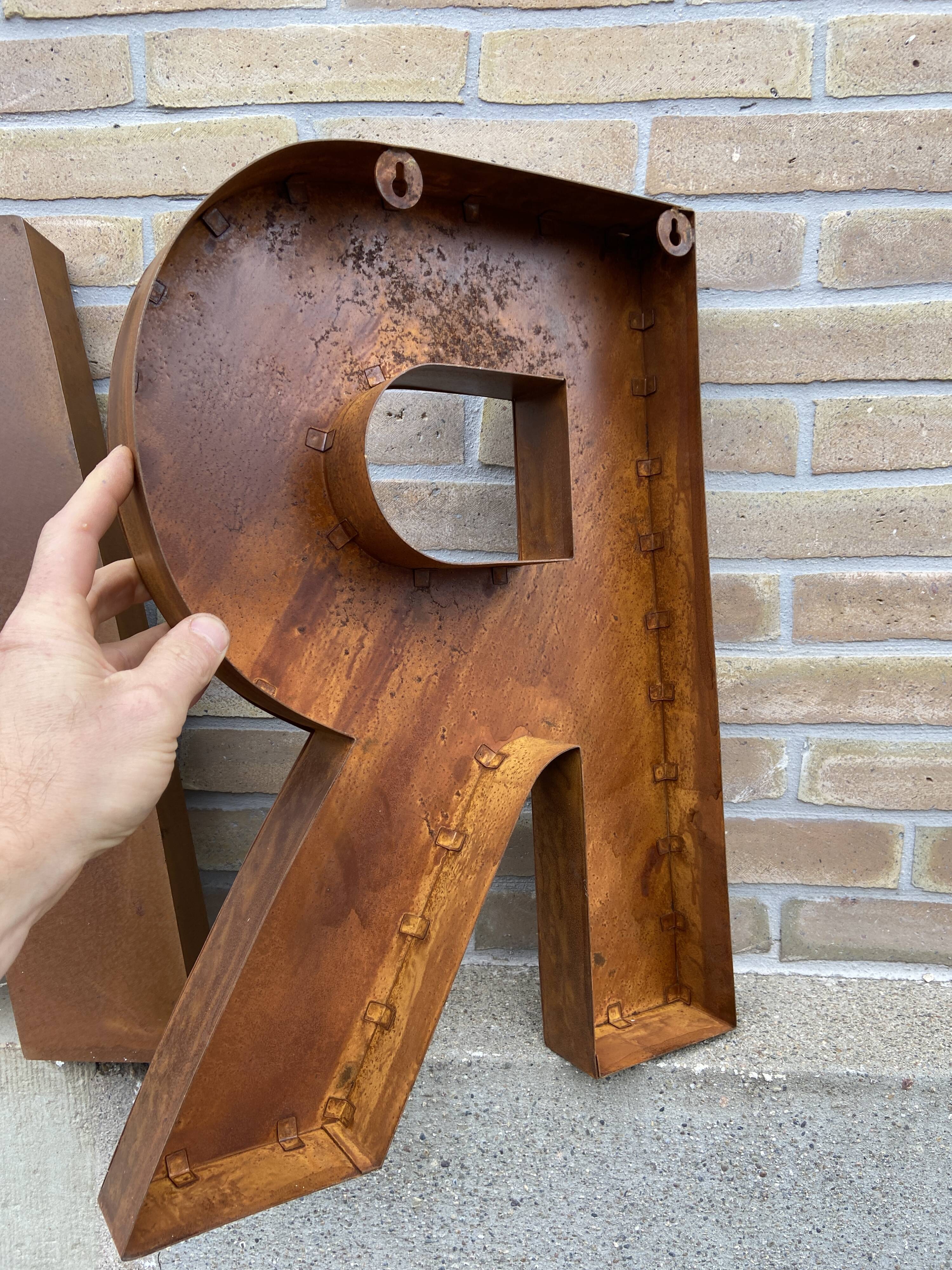 Bar sign in vintage metal letters
