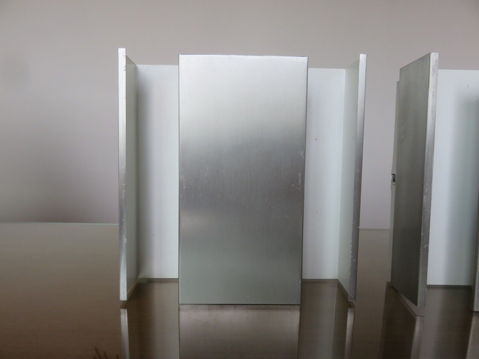 Series of 3 aluminum wall lamps, modernist, minimalist 70s