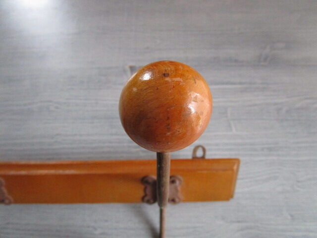 Old coat hangers in wood and metal