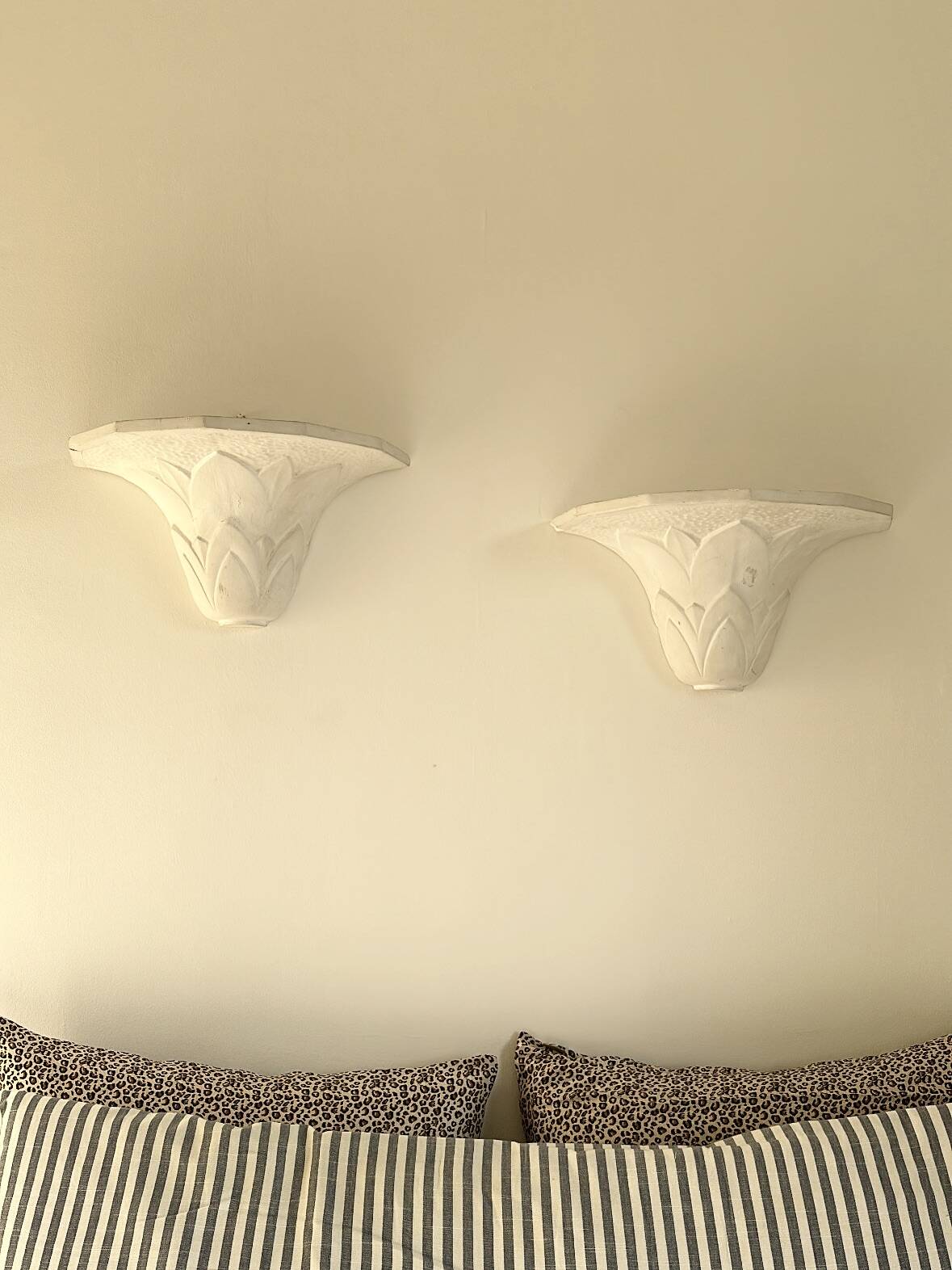 Pair of plaster wall sconces, palmette decoration, 20th century
