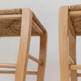 Lot of 2 vintage wooden stools from the 1980s, with hand-woven straw seats.