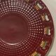 Burgundy and gold openwork plate in ceramic from Saint-Clement, 1950s.