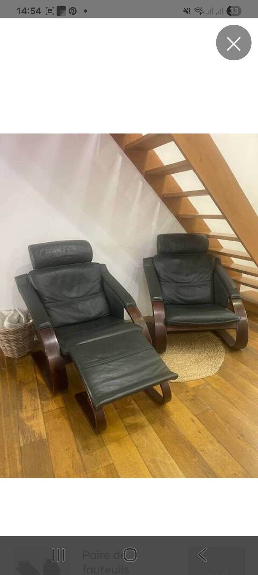 Pair of Scandinavian armchairs with a footrest from the brand NELO.