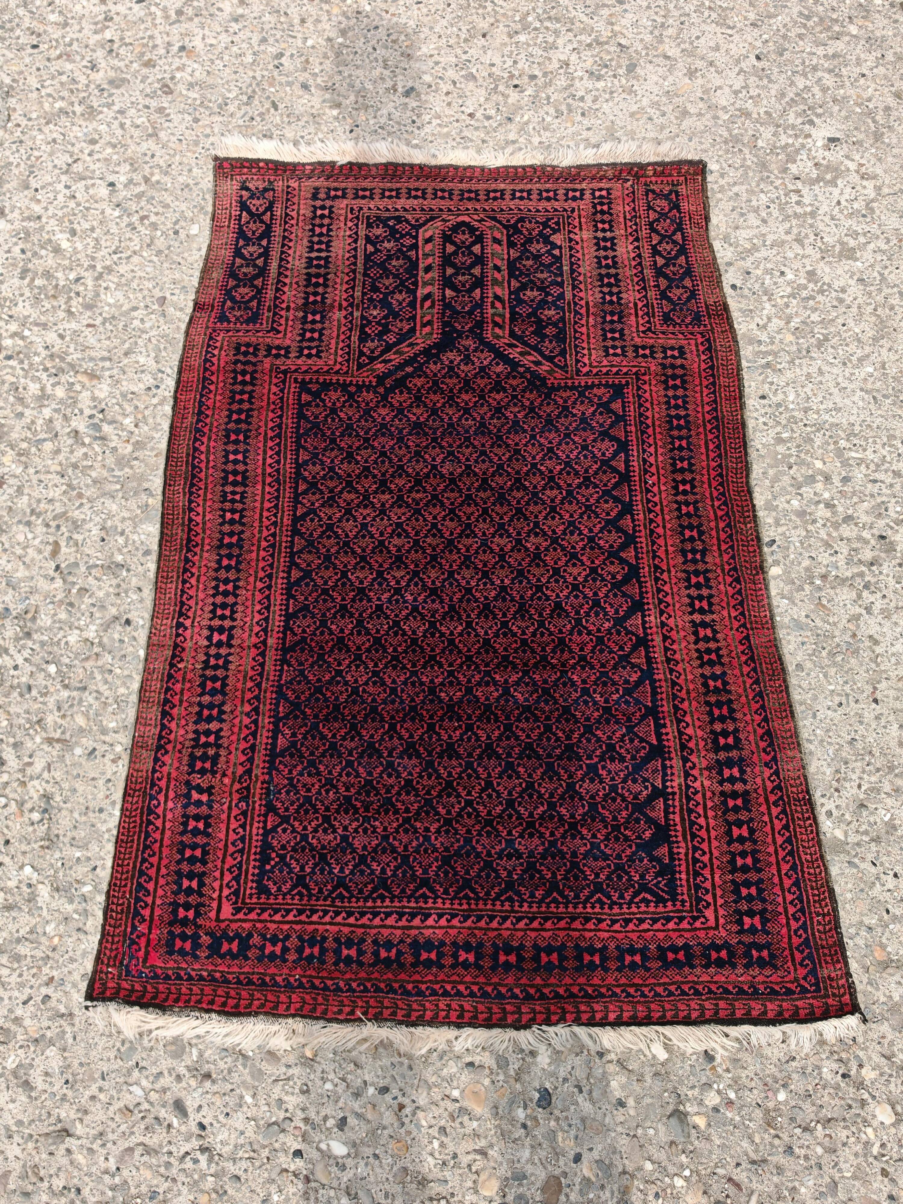 Vintage Persian Baluch prayer rug in wool from the 1950s.