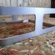 Table basse 1970 en verre fumé et aluminium