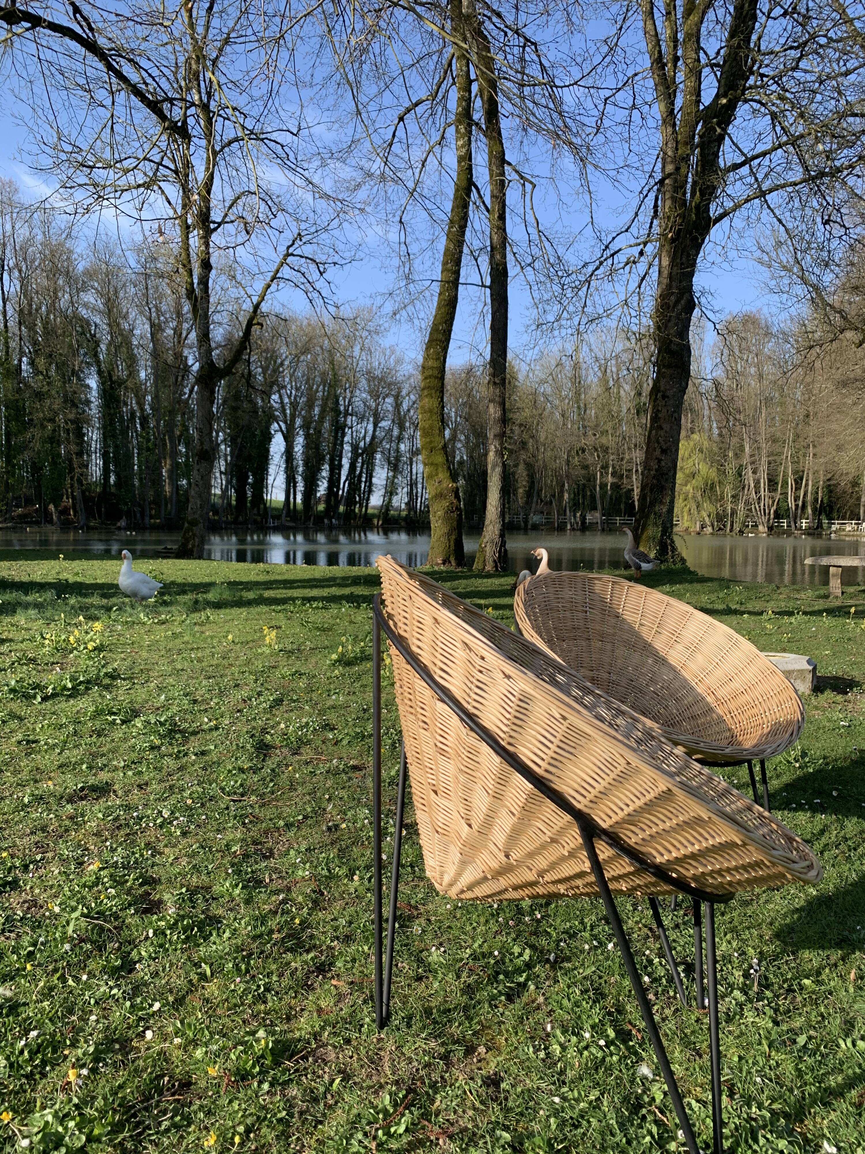 Pair of wicker basket armchairs