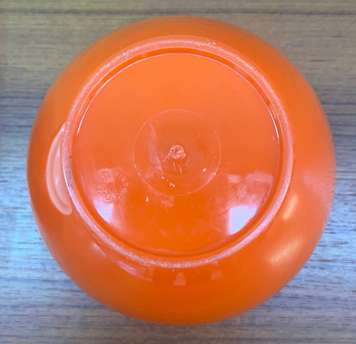 Orange plastic ice cube bucket from the 80s