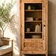 Antique glass-fronted cabinet in solid wood – restored family piece