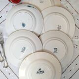 Assiettes plates anciennes dépareillées accompagnées d'un plat