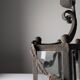 Wrought iron lantern with glass panels, leaf motifs