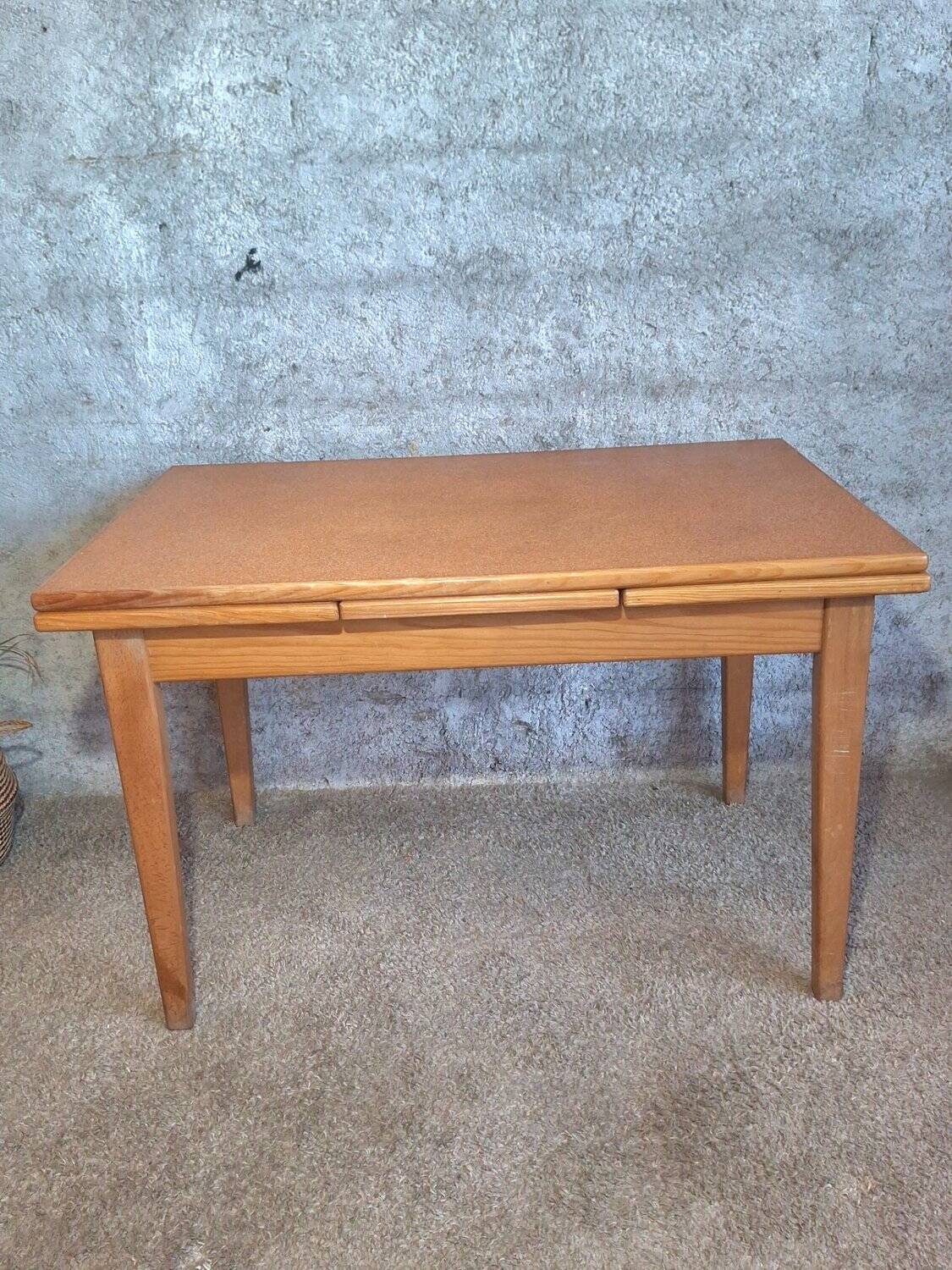 1950s dining table with sliding extensions