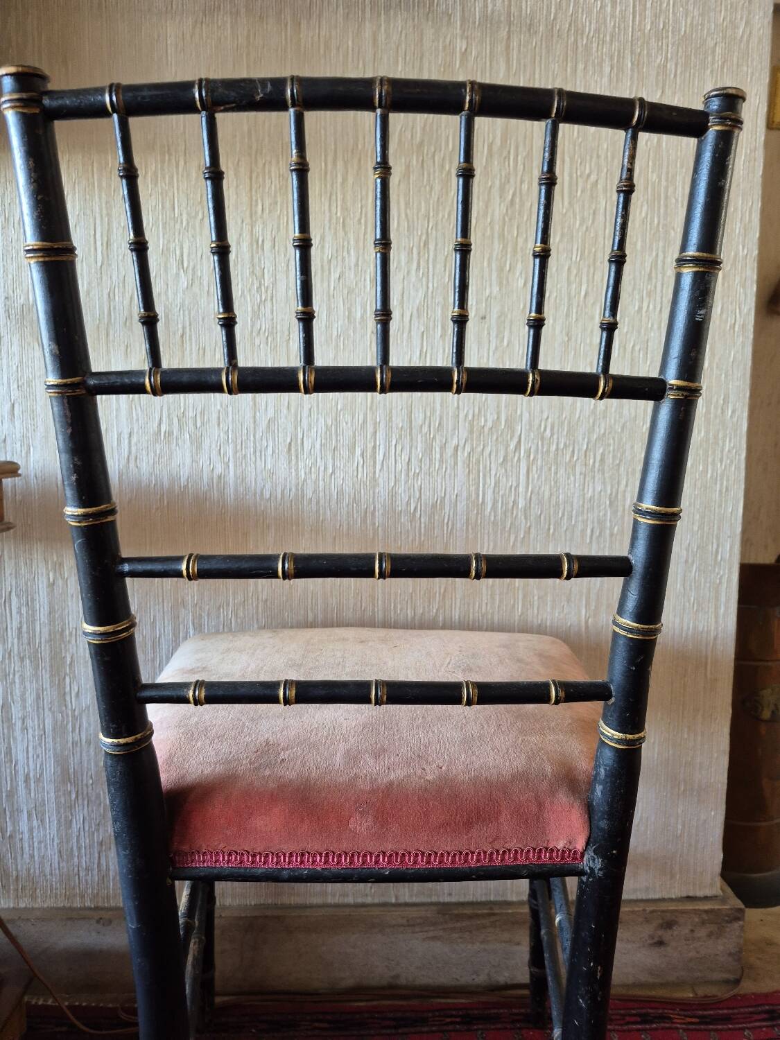 Small Napoléon III chair in black bamboo with a red velvet seat.