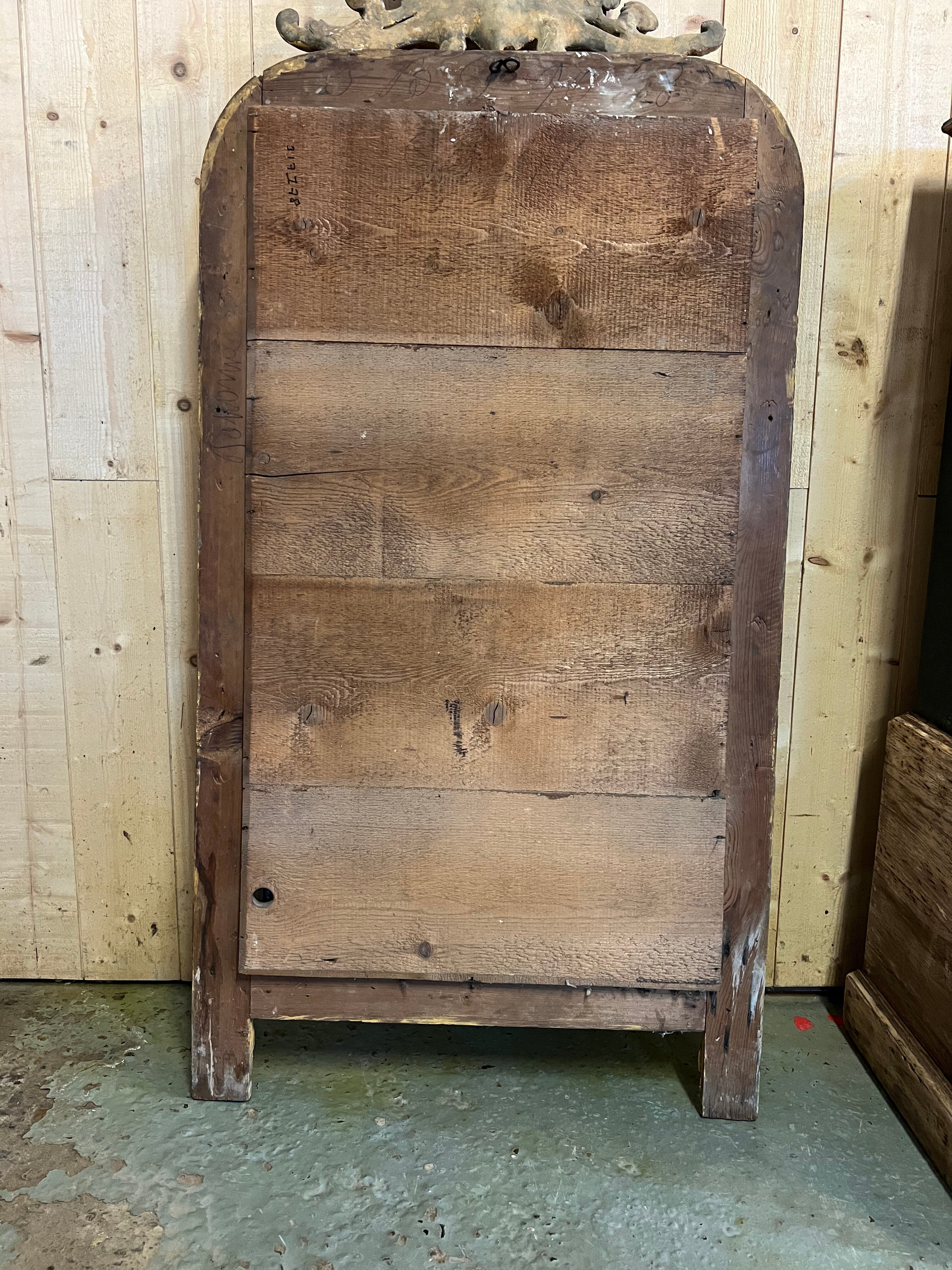 Louis Philippe mirror with a mercury pediment