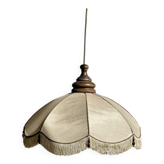Small chandelier with cream fringed fabric lampshade