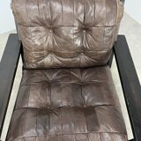 Living room sofa and brutalist armchairs in leather and wood, 70s, chalet style