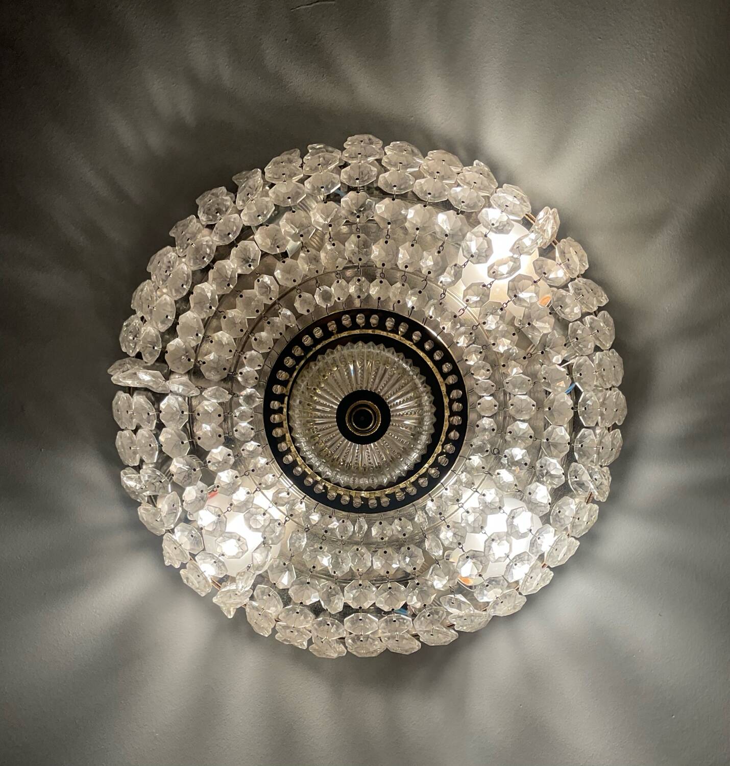 Vintage ceiling light with pendants and brass.