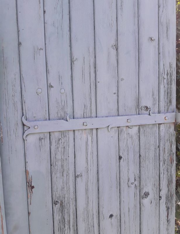 Pair of large wooden iron hanging shutters