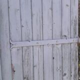 Pair of large wooden iron hanging shutters