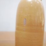Vintage glazed terracotta bottle