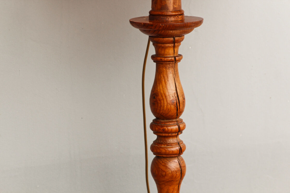Carved wooden lamp, fiber shade