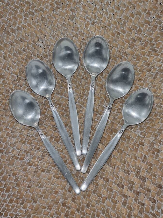 Small silver-plated metal spoons