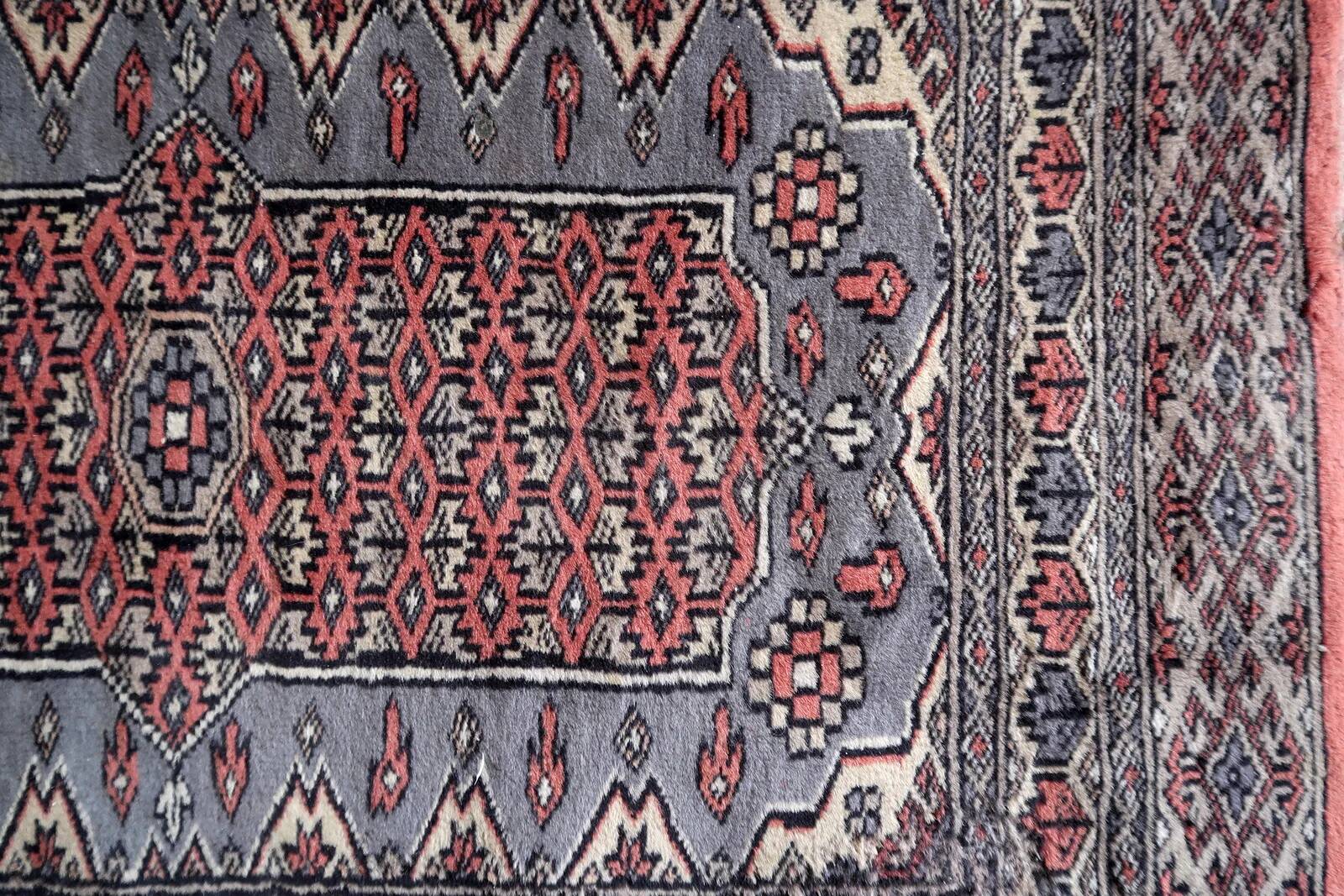 Handmade vintage Uzbek Bukhara rug 64cm x 94cm 1950s