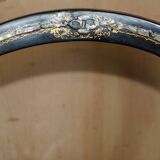 Four antique Regency bergère chairs with mother-of-pearl inlay.