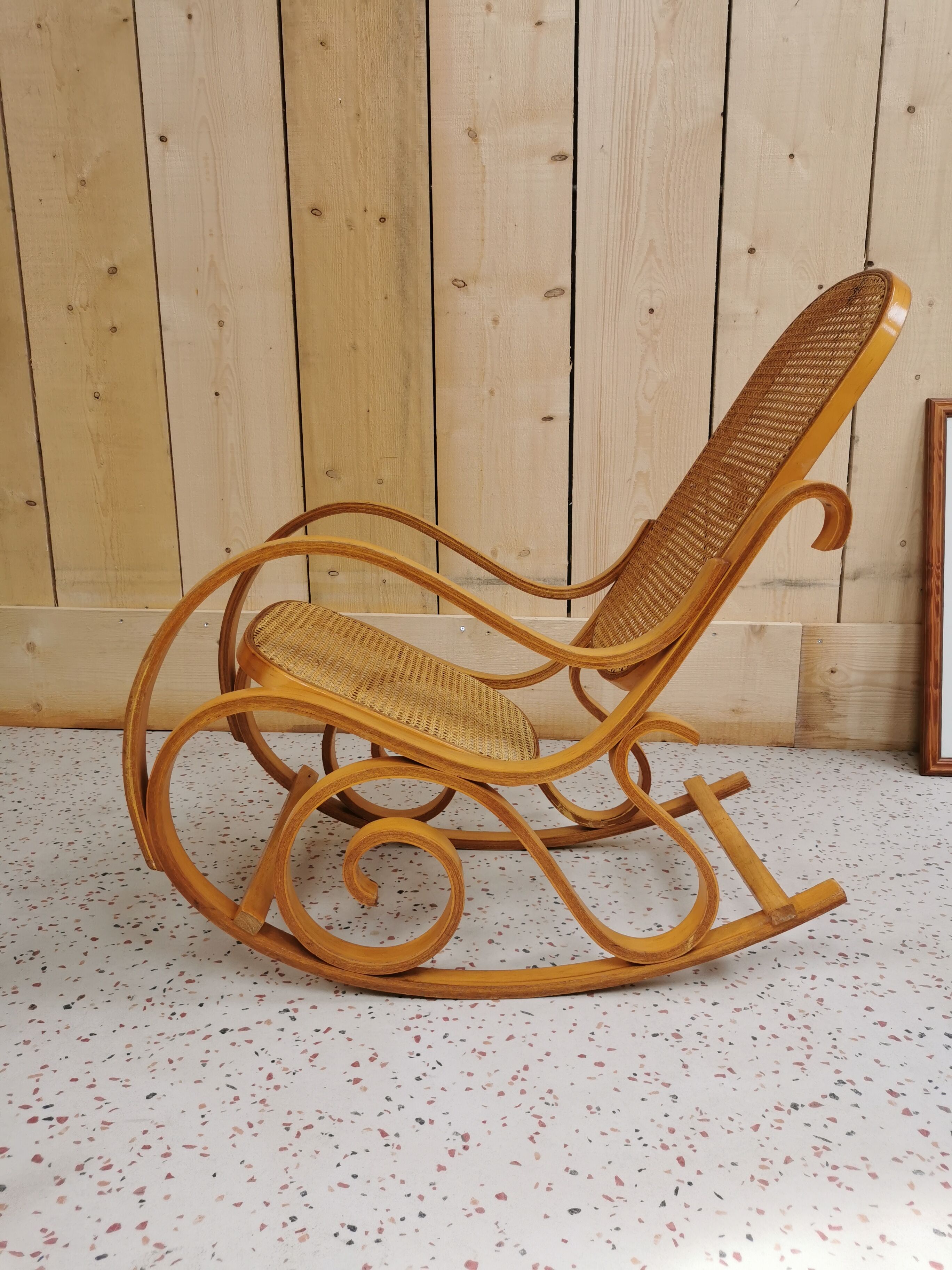 Rocking chair in caning