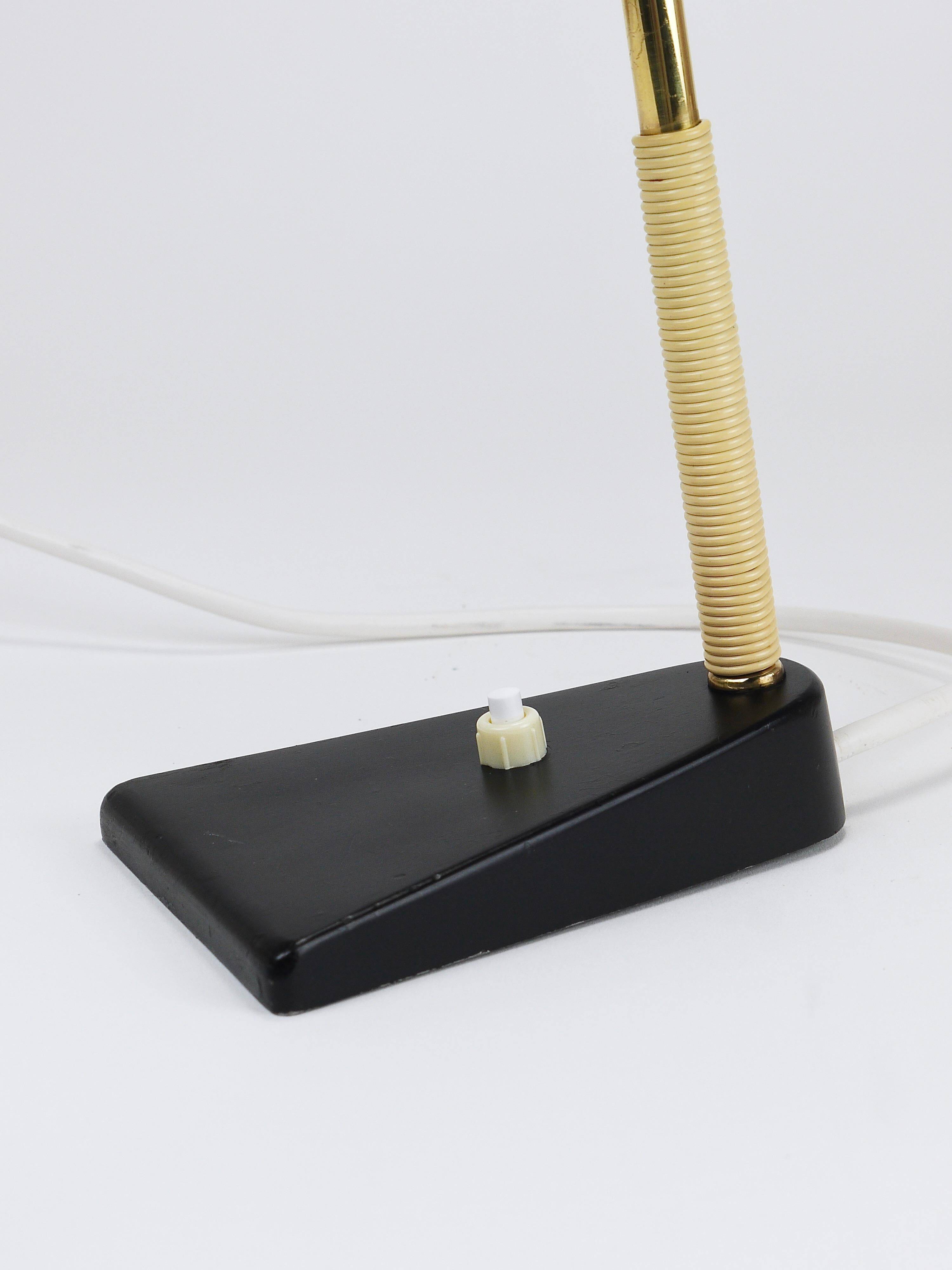 Yellow desk, table or accent lamp by J.T. Kalmar, brass and iron, Vienna, Austria, 1950s.