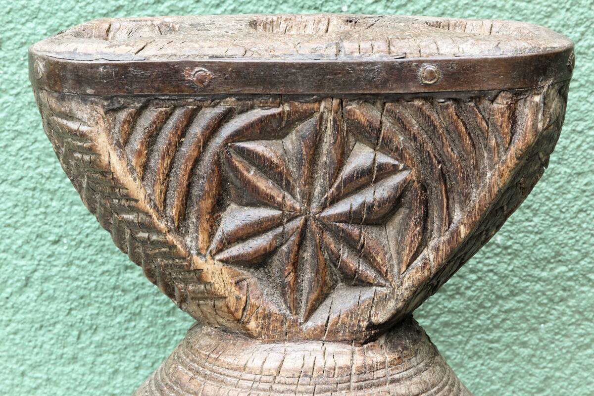 Brutalist candlestick, antique Asian grain sorter in carved wood.