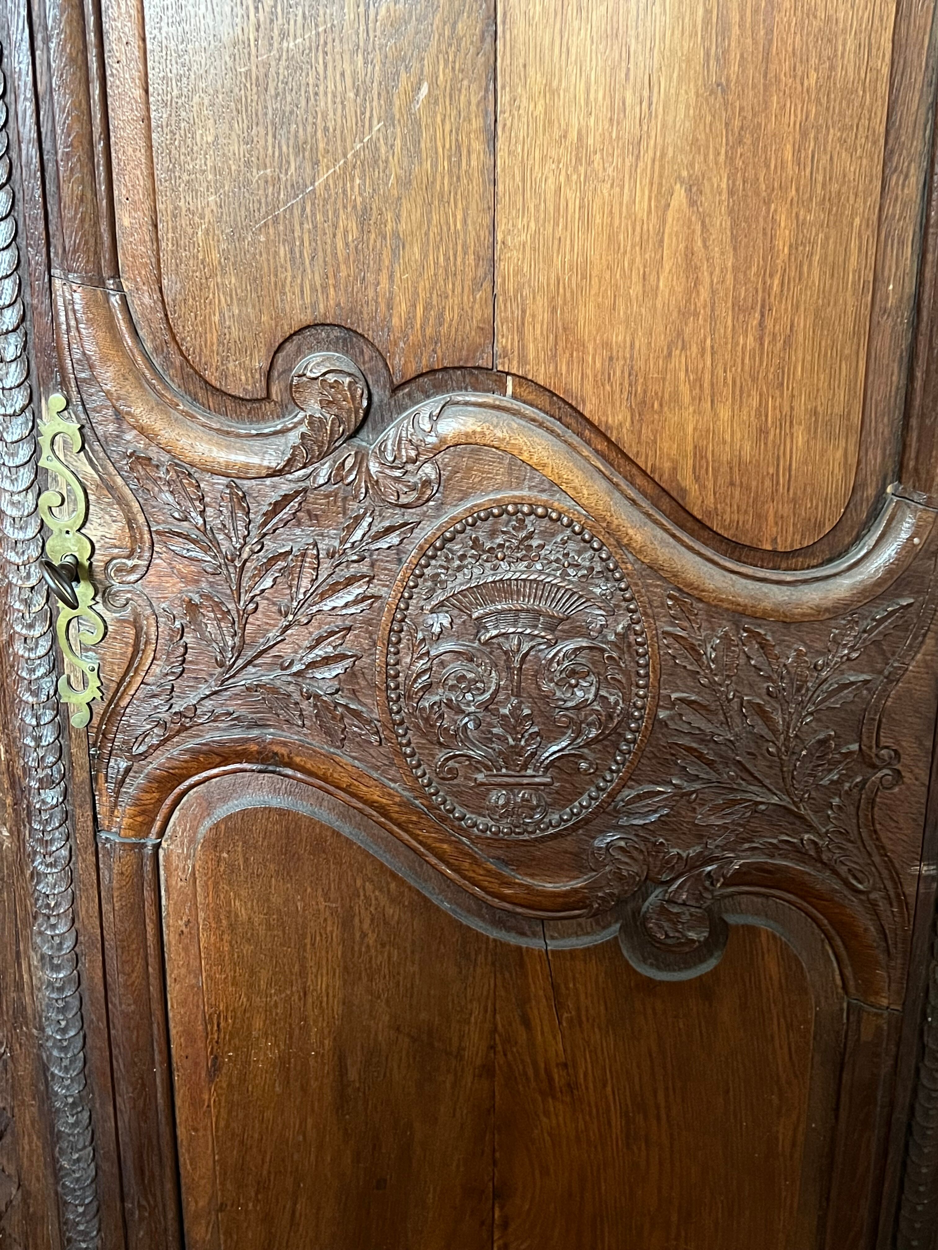 Beautiful and ancient Norman wedding wardrobe, richly carved