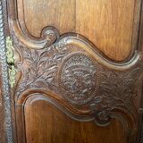 Beautiful and ancient Norman wedding wardrobe, richly carved
