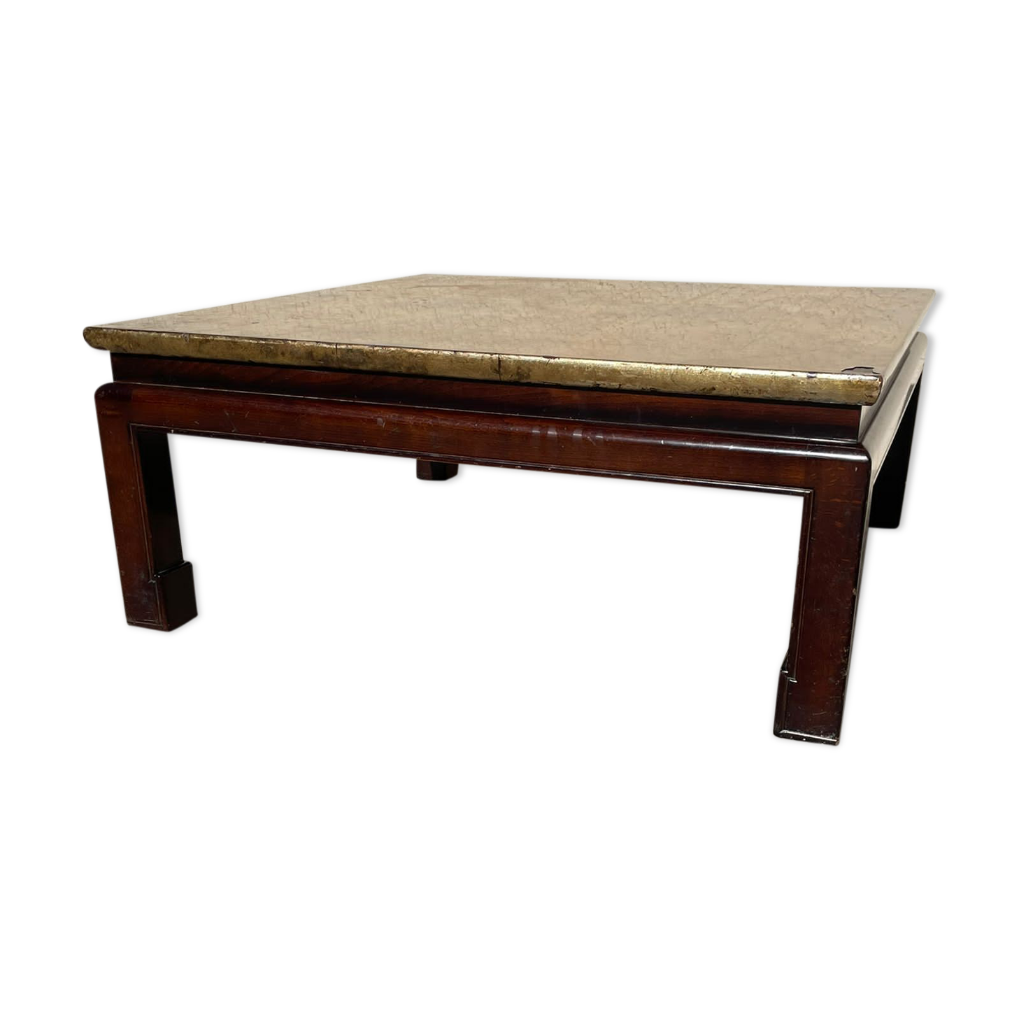 Coffee table covered with gold leaf