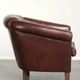 Sheepskin club armchair in English style with brown colour scheme
