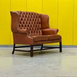 English Georgian Style Tufted Leather Chesterfield Wingback Two Seater Sofa