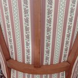 Pair of carved bergere armchairs