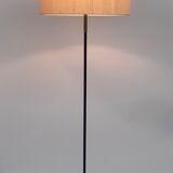 Floor lamp model 641 on metal tripod patinated rifle and elements in lunel brass