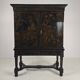 A rare early 18th-century Dutch japanned chinoiserie cabinet, circa 1700