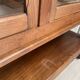 Solid wood display cabinet.