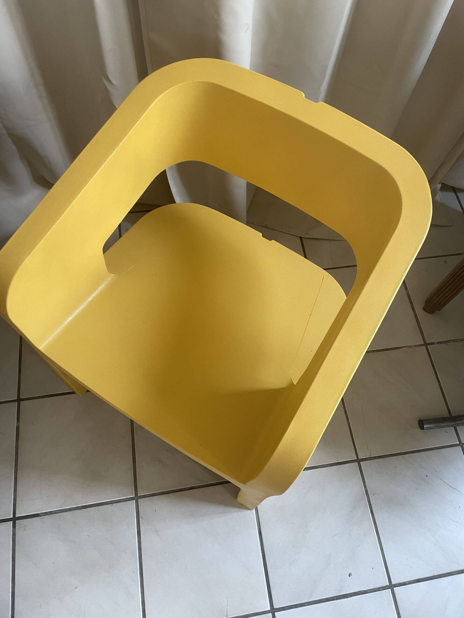 Orange-yellow designer armchair