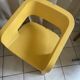 Orange-yellow designer armchair