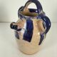 Old pitcher (goat) in cobalt glazed earthenware