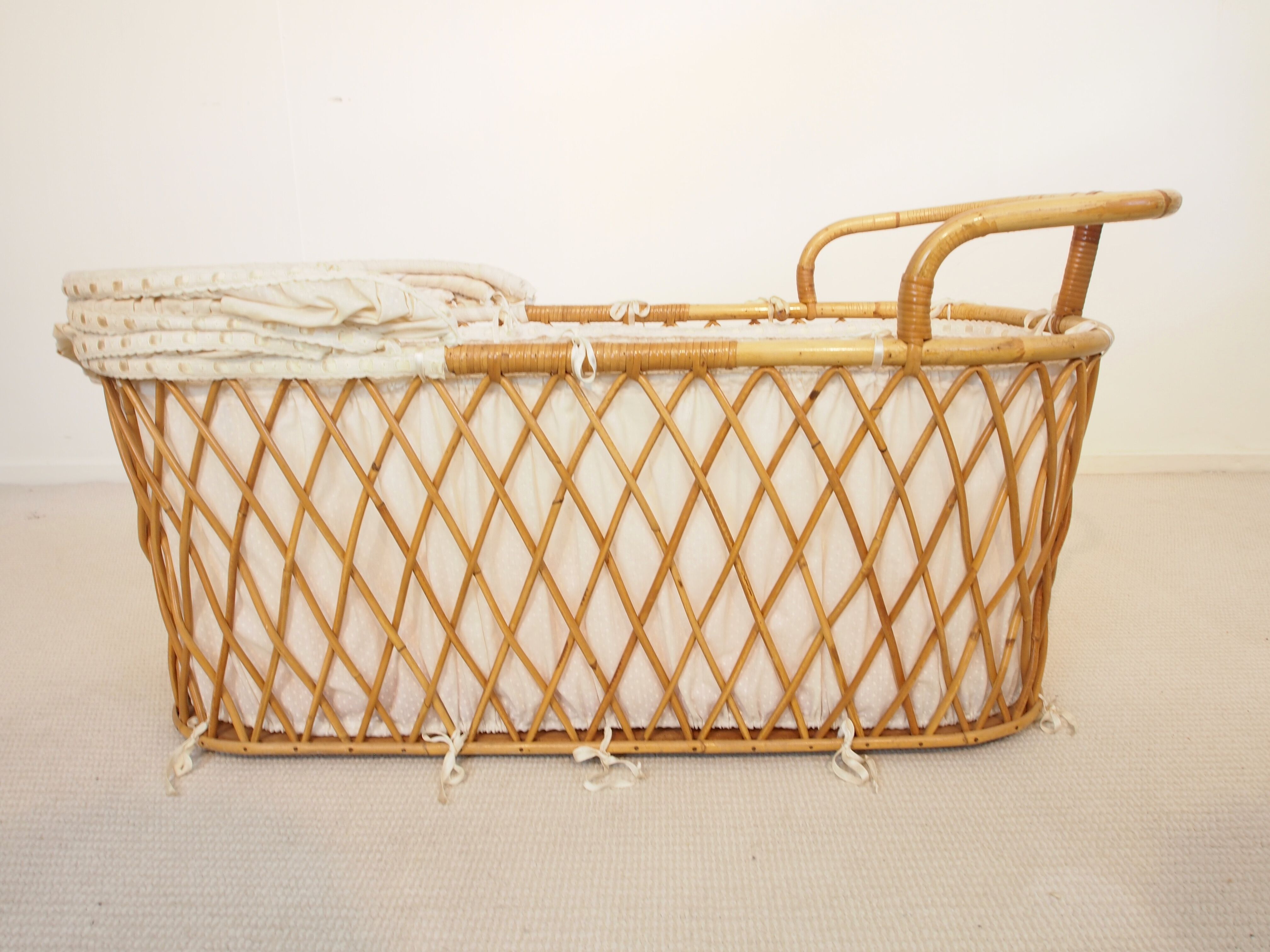 Vintage mid century rattan cradle