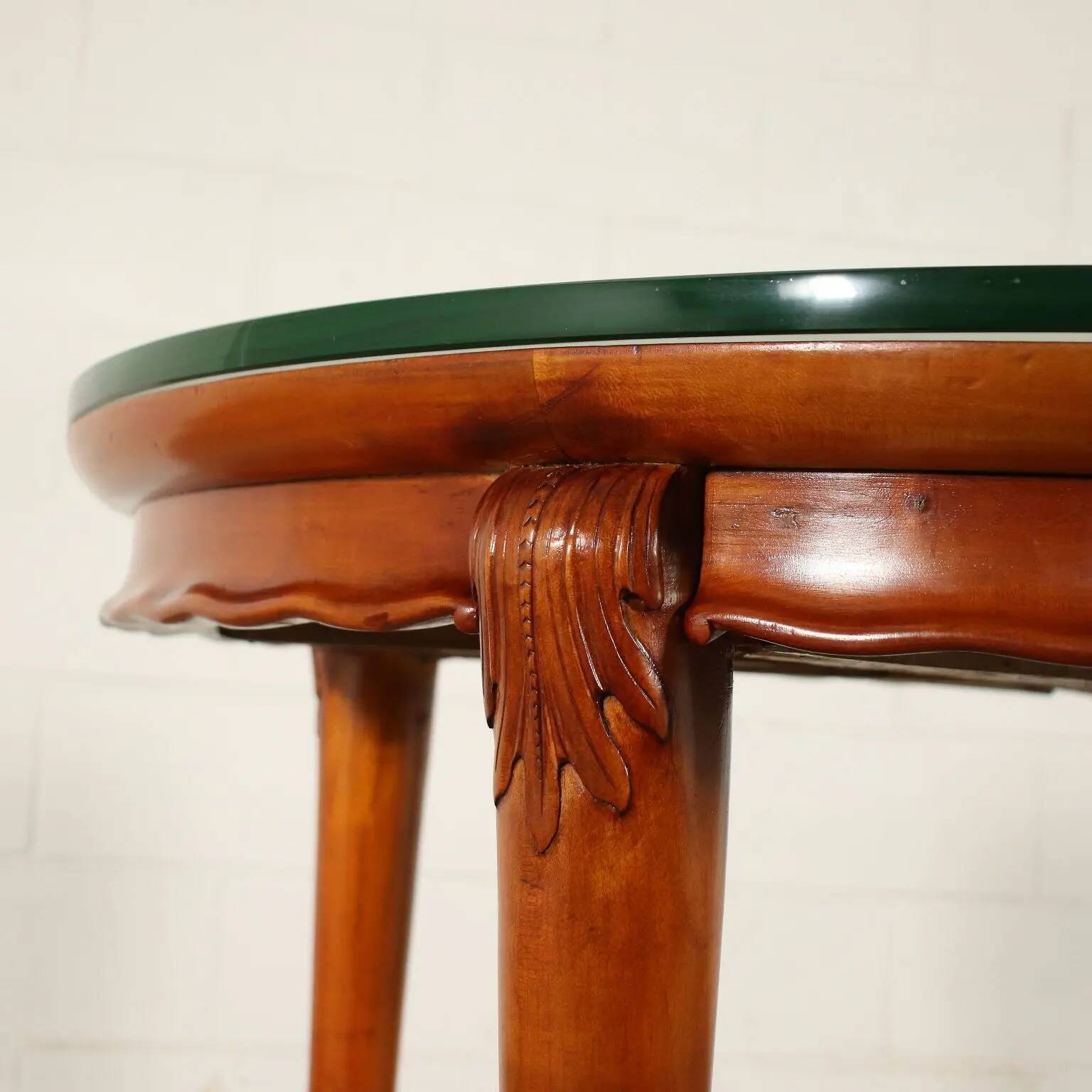 Table in solid beech, mahogany veneer and glass, Italy, 1950s.