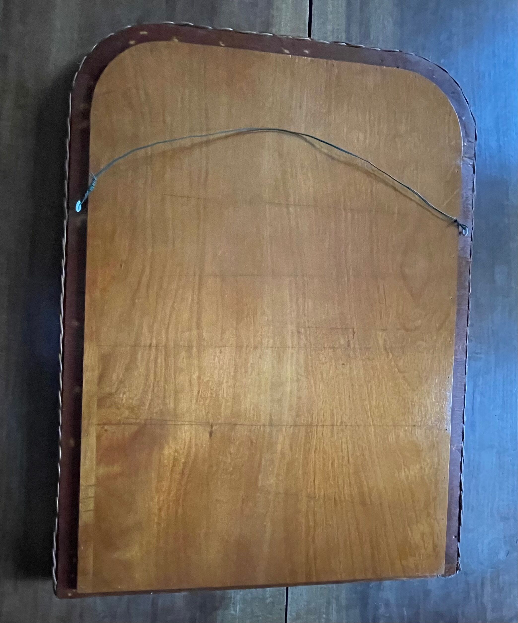 Curved rattan mirror 70s