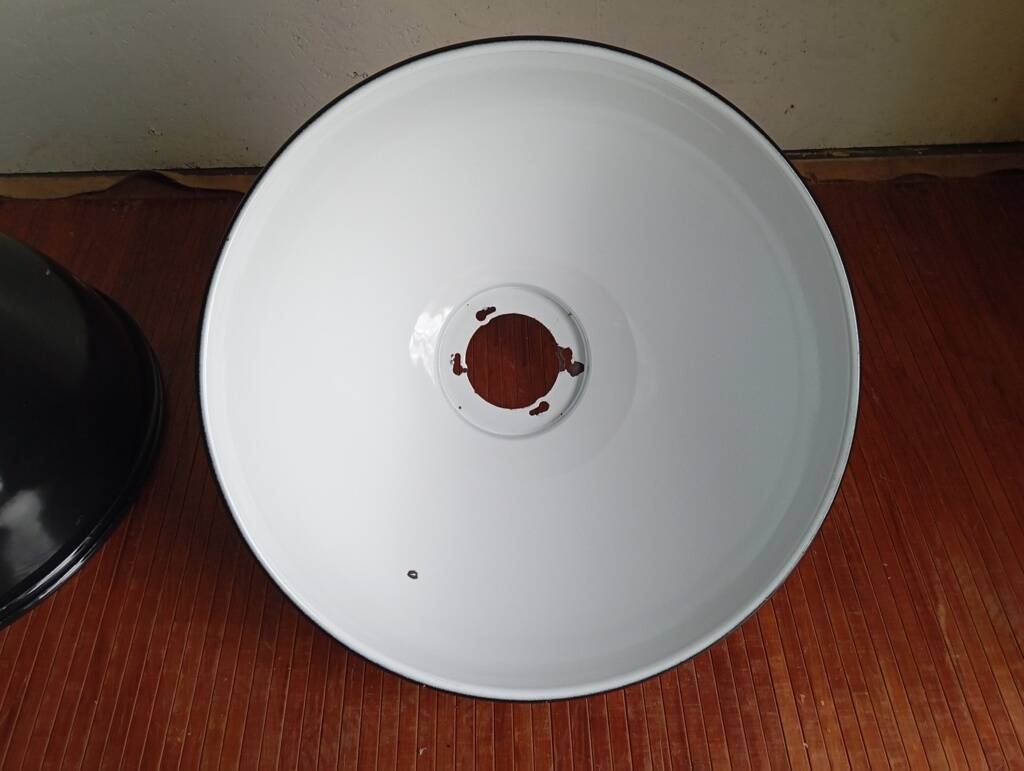 Set of 10 large industrial enamelled metal pendants.