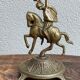 Pair of cavalier candlesticks