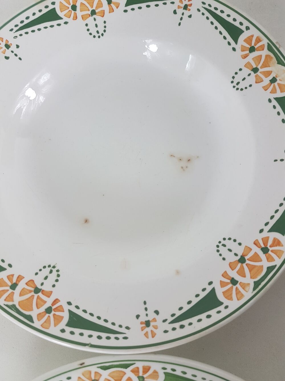 12 hollow plates made of Longwy earthenware
