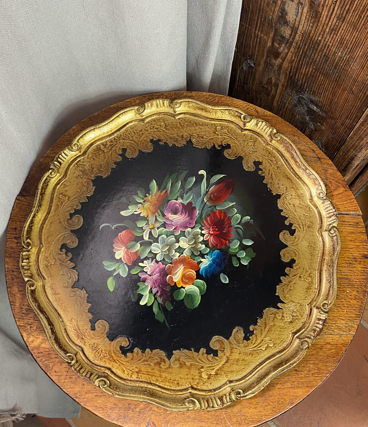 Round painted wooden platter